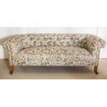 CHESTERFIELD SOFA, late Victorian satinwood, circa 1890, in buttoned figure, animal and foliate