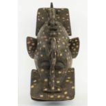 SENUFO FIRESPITTER MASK, Ivory Coast, carved wood, used in funerals of the Senufo people, 55cm H.