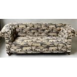 SAFARI CHESTERFIELD, Victorian button back and scroll arms with grey safari pattern woven