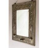 WALL MIRROR, late 19th century Art Nouveau inspired with repoussé silvered frame, sconces lacking,