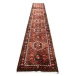 FINE PERSIAN KARAJA LONG RUNNER, 465cm x 75cm.