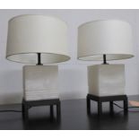 BAKER FURNITURE TEA POY TABLE LAMPS, a pair, by Bill Sofield, with shades, 58cm H. (2)