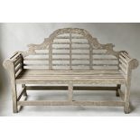 AFTER SIR EDWIN LUTYENS, Lutyens style garden bench, weathered teak and slatted, 168cm W.