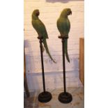 PARROTS ON STANDS, a pair, polychrome finish, 120cm tall. (2)