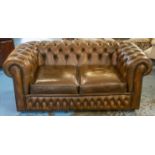 CHESTERFIELD SOFA, buttoned brown leather with two seat cushions on castors, 167cm x 98cm.