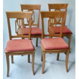 KITCHEN CHAIRS, a set of four, pine stick back with shaped solid seats and orange cushions, 97cm