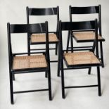 HABITAT FOLDING CHAIRS, a set of four black folding frames with cane woven seats, 83cm H. (4)