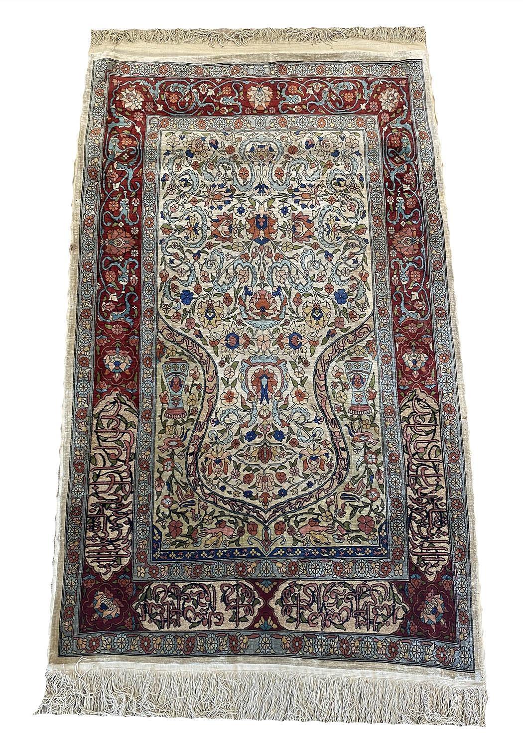 FINE KAYSERIE SILK AND METAL THREAD RUG, 130cm x 74cm.