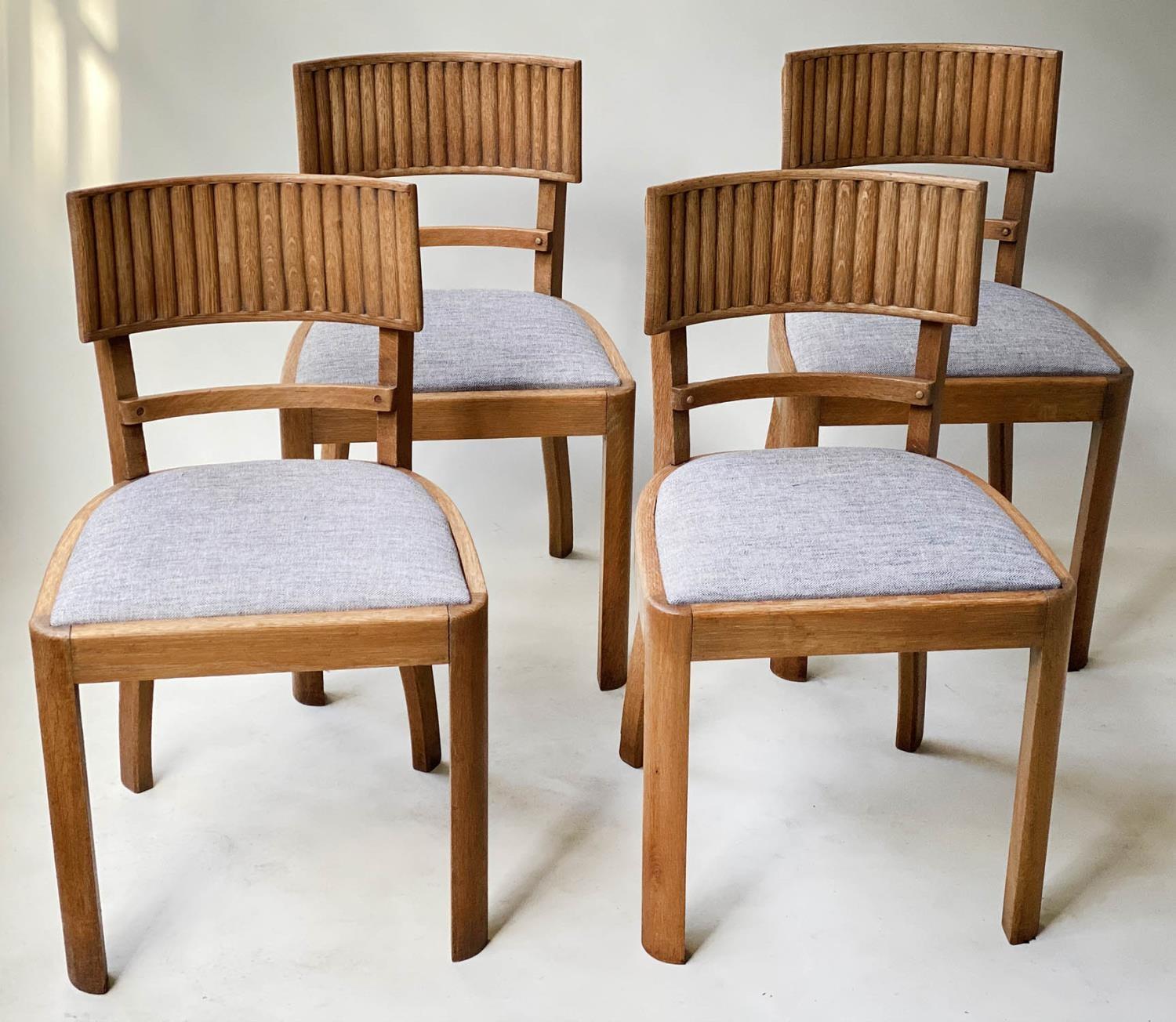 DINING CHAIRS, a set of four oak with ridged bar back and tweed seats. (4)