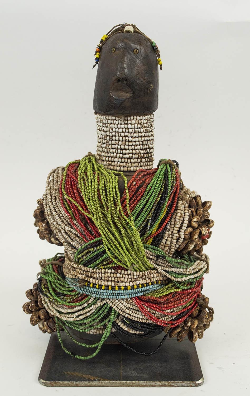 FALI RITUAL DOLL, from Cameroon, adorned with beads and cowrie shells, 40cm H.