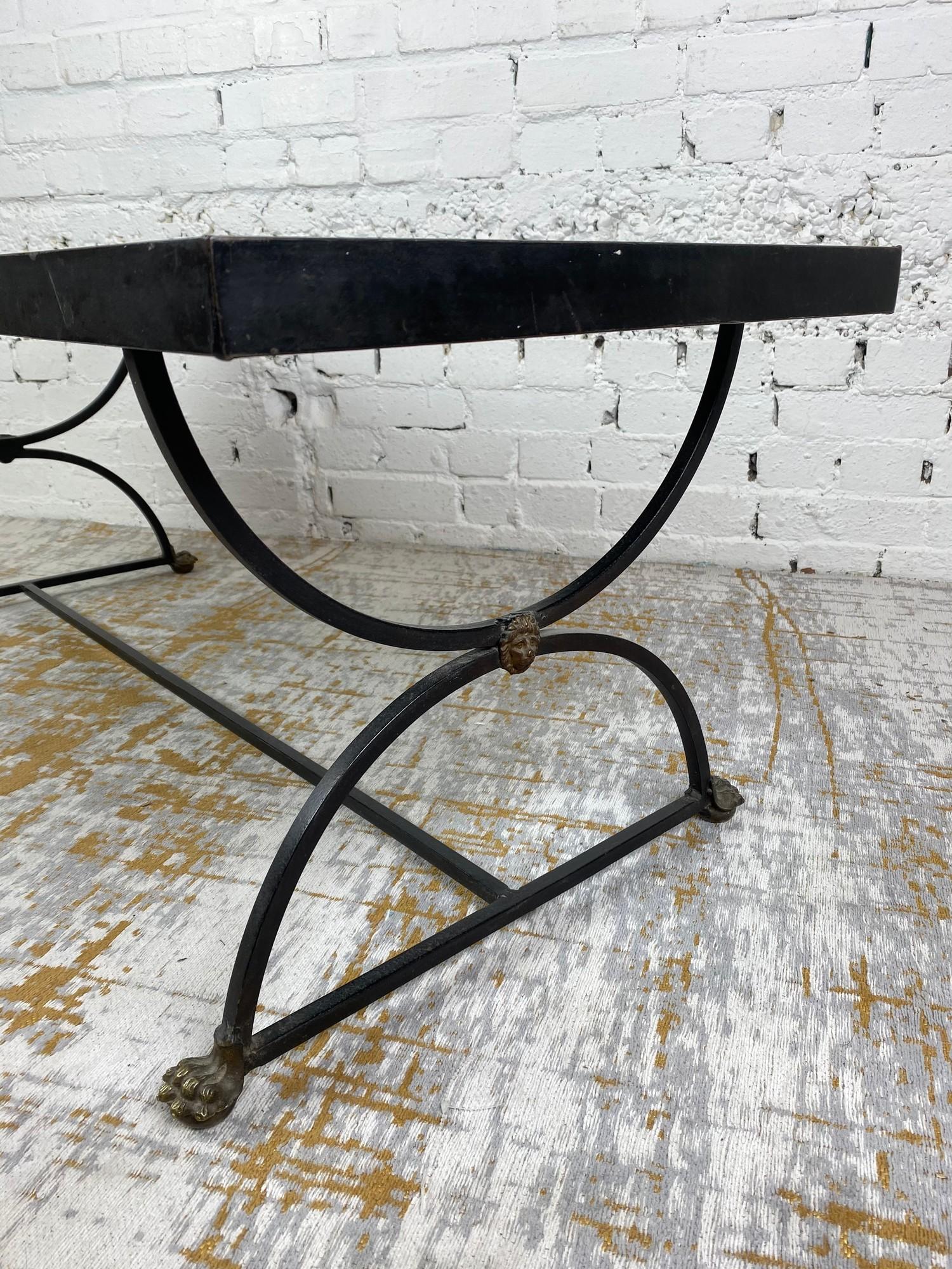 LOW TABLE, Regency design, simulated marble top above a steel base with brass lion head detail and - Image 4 of 7