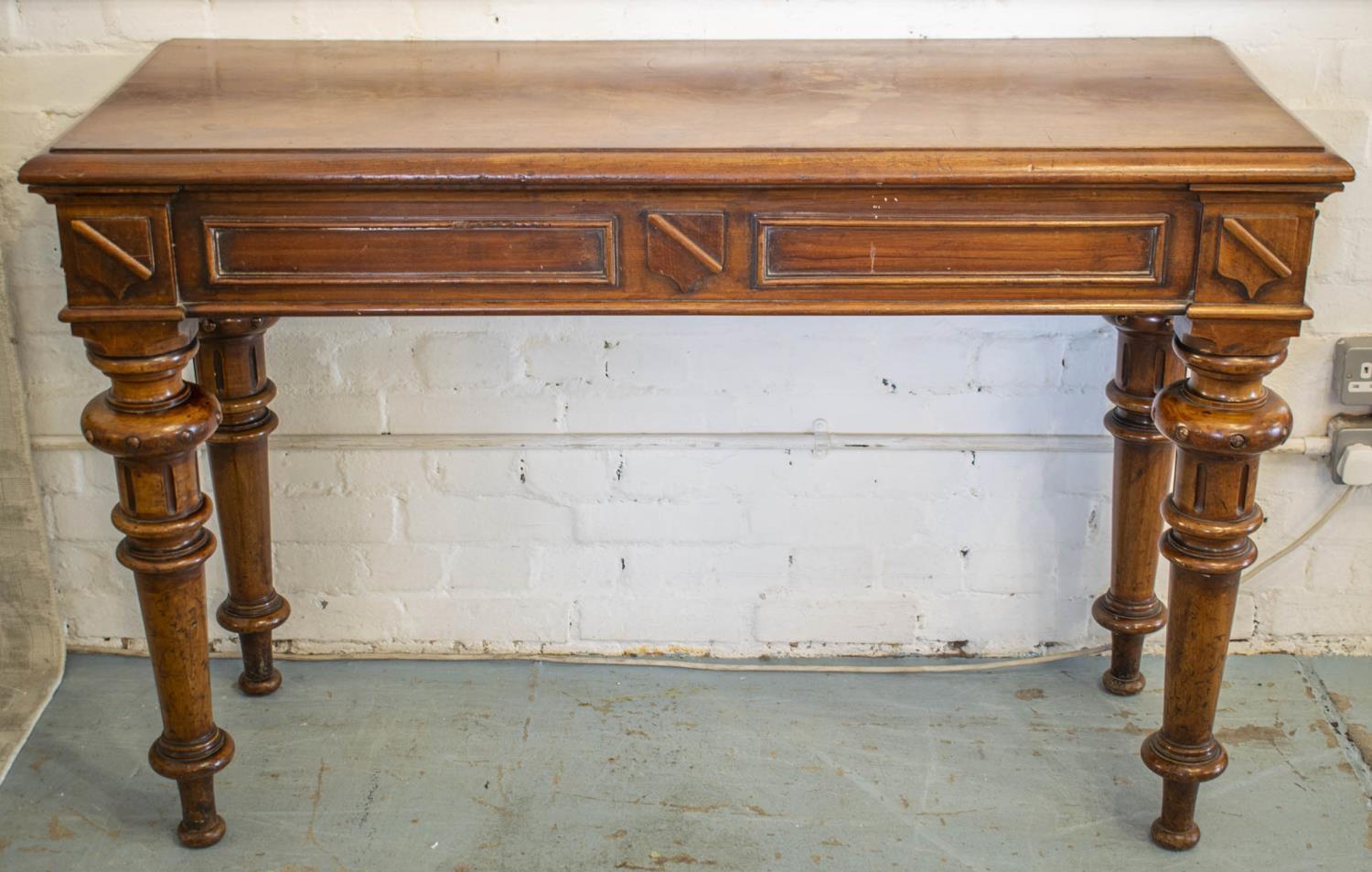 SIDE TABLE, Victorian mahogany, circa 1850 with shield moulded frieze on turned legs, adapted drawer