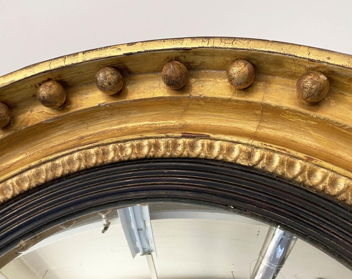 CONVEX WALL MIRROR, Regency period giltwood with ball encrusted frame, ebonised slip and convex - Image 4 of 6