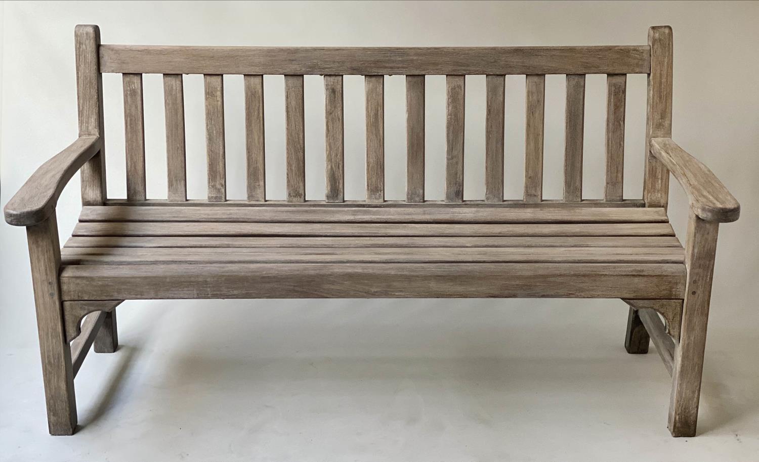 GARDEN BENCH, weathered teak of slatted construction with flat top arms, 160cm W.