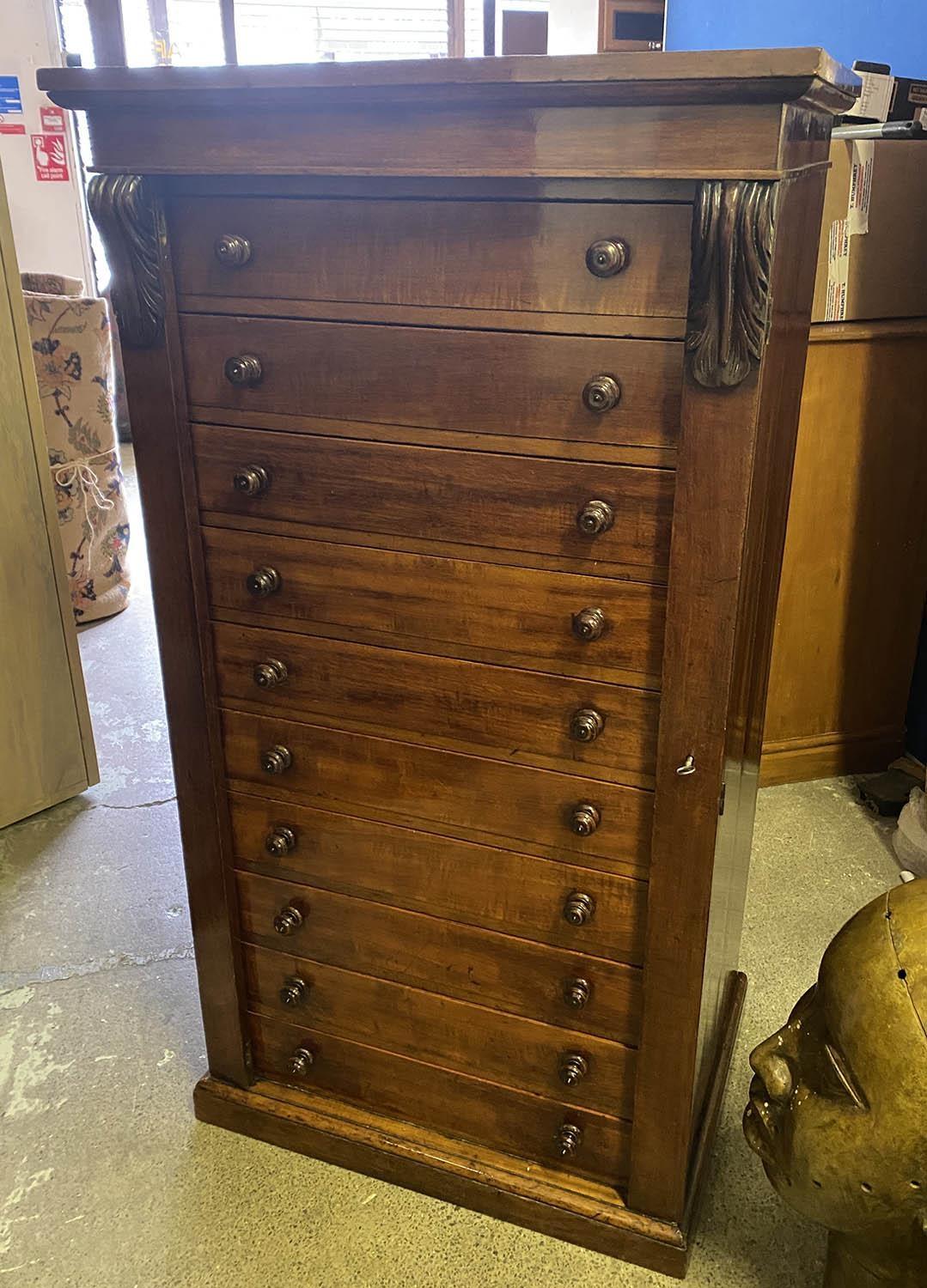 WELLINGTON CHEST, Victorian mahogany with ten drawers enclosed by twin stiles, 71cm x 51cm x 133cm