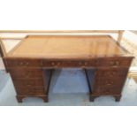 PEDESTAL DESK, mahogany with a tan tooled leather top above eight drawers, 152cm W x 76cm H x 91cm
