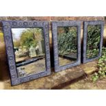 GARDEN WALL MIRRORS, a set of three, Islamic style, black painted metal frames, 90cm x 63cm. (3)