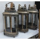 STORM LANTERNS, a set of three, antiqued gilt finish, 58cm H. (3)