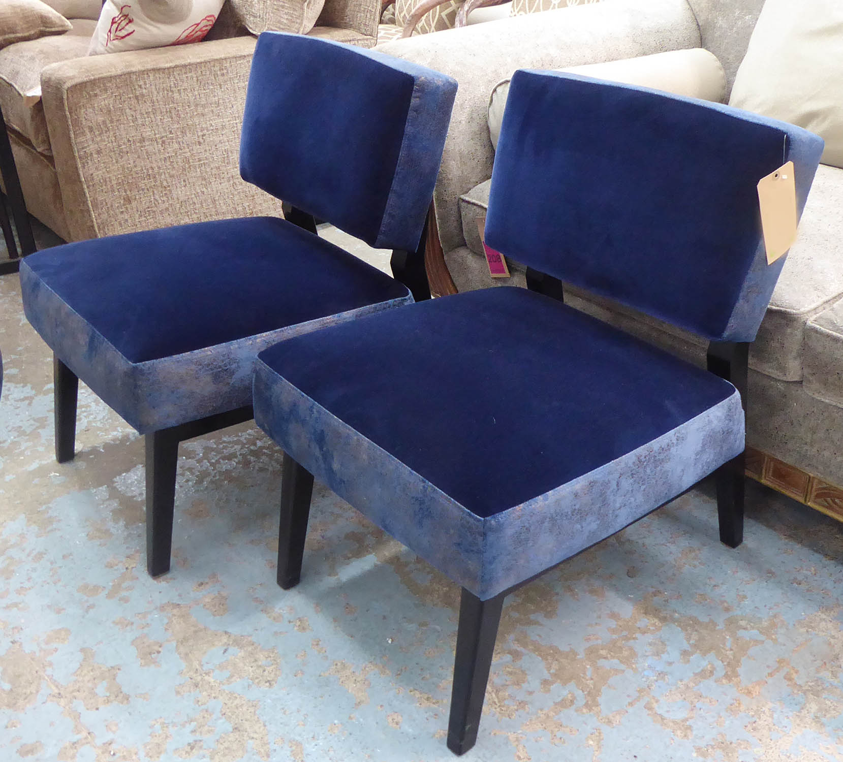 LOUNGE CHAIRS, a pair, blue velvet with contrasting fabric detail with ebonised frame, 55cm W. (2)