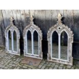 WALL MIRRORS, a set of three, Gothic revival style, 60cm x 116cm. (3)