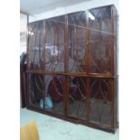 LIBRARY BOOKCASE, late 19th century mahogany with two pairs of interlaced oval astragal glazed doors