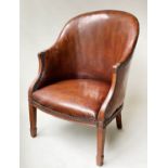 LIBRARY ARMCHAIR, Edwardian mahogany with hand dyed and brass studded tobacco brown leather
