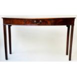 HALL/SERVING TABLE, George III flame mahogany of shallow bow form with frieze drawer and channeled