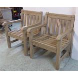 GARDEN ARMCHAIRS, a pair, distressed painted teak, each 65cm x 89cm H. (2)