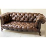 CHESTERFIELD SOFA, early 20th century Edwardian aged and faded brown leather with horsehair buttoned
