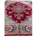 ANTIQUE PERSIAN KIRMAN LAVER CARPET, 395cm x 295cm.