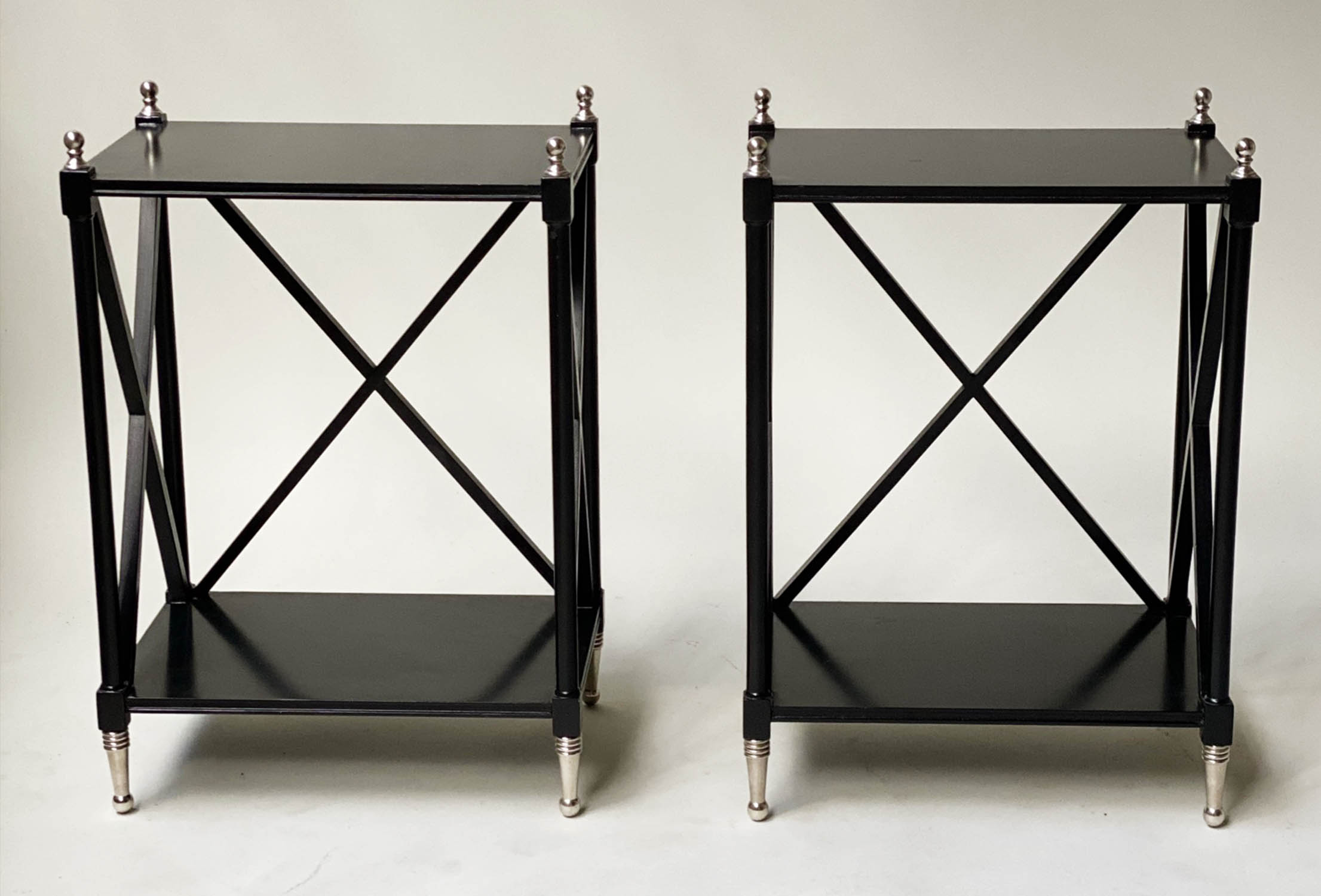 LAMP TABLES, a pair, black lacquered and chrome mounted with X supports, 35cm W. (2)