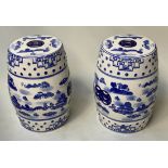 CHINESE STOOLS, a pair, blue and white ceramic pierced barrel form, 46cm H. (2)