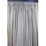 CURTAINS, two pairs, with a patterned leading edge, lined and interlined, one pair each curtain