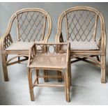 CONSERVATORY ARMCHAIRS, a pair, rattan and cane bound with trellis panels, 62cm W together with a