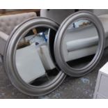 WALL MIRRORS, a pair, Continental style, silvered frames, 91cm diam. (2)