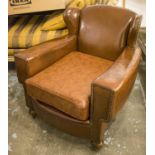 CLUB ARMCHAIR, early 20th century in original brown leather with slight wing back and modern leather