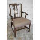 OPEN ARMCHAIR, George III mahogany with carved detail and stuffover seat, 62cm x 92cm H.