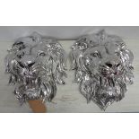 LION HEAD WALL RELIEFS, a pair, 50cm x 45cm x 25cm.