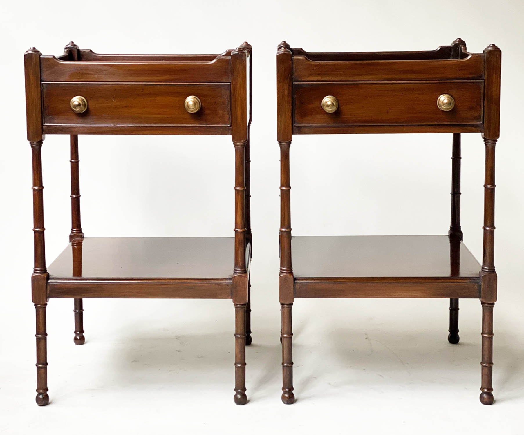 LAMP TABLES, a pair, George III design mahogany, each galleried with frieze drawer and under tier,