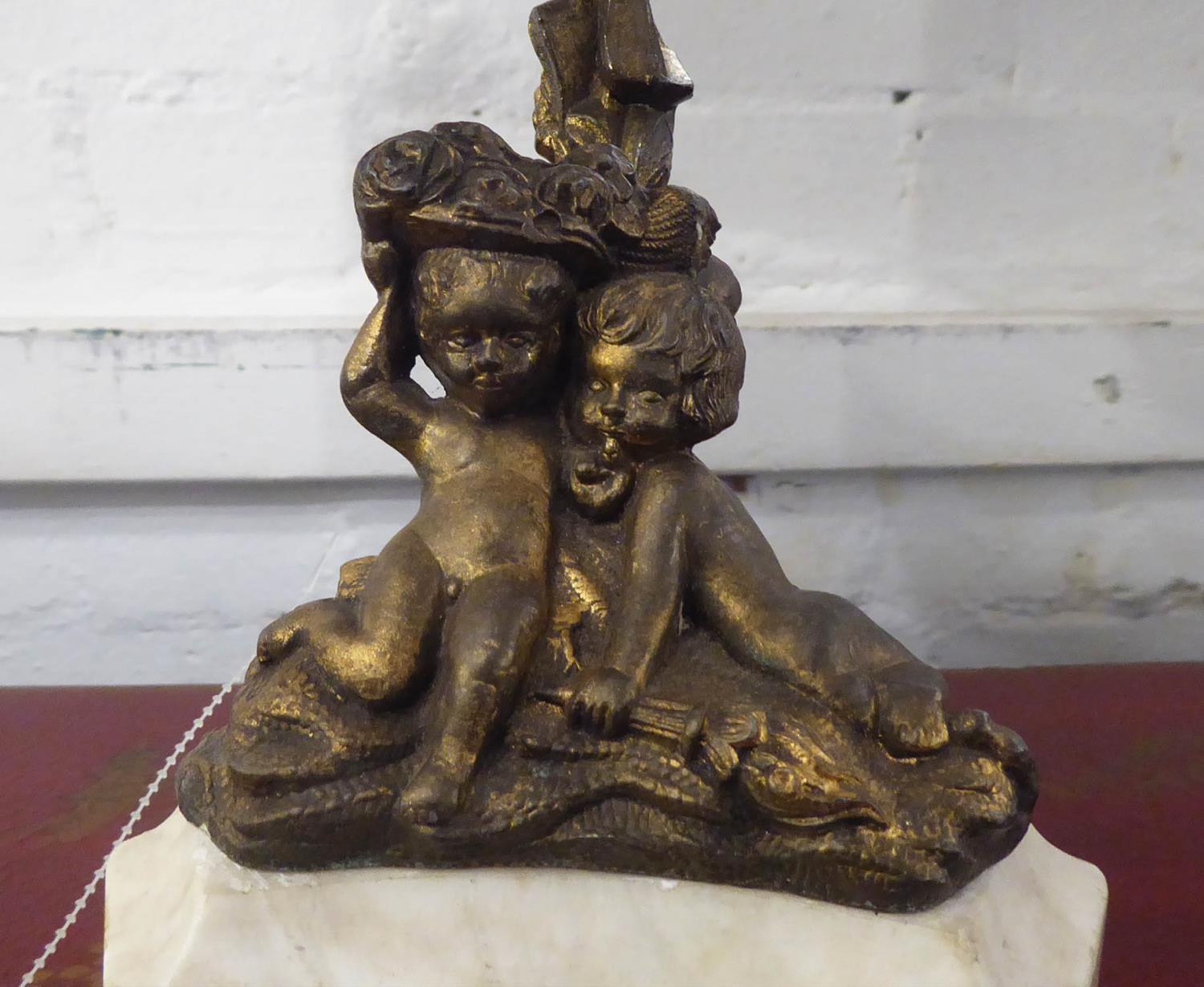 TABLE LAMPS, a pair, with gilt metal putti on triform marble bases, 52cm H including shades. (2) - Image 2 of 4