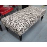 FOOTSTOOL, in black and white leopard spot fabric, 41cm H x 65cm x 127cm L.