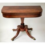 TEA TABLE, Regency figured mahogany and ebony line inlaid D shaped fold over with four outswept