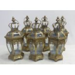 STORM LANTERNS, a set of six, gilt metal and glass, 39cm H. (6)