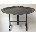 VICTORIAN TRAY ON STAND, black papier mâché, scalloped oval gilt vine leaf decoration, folding, on