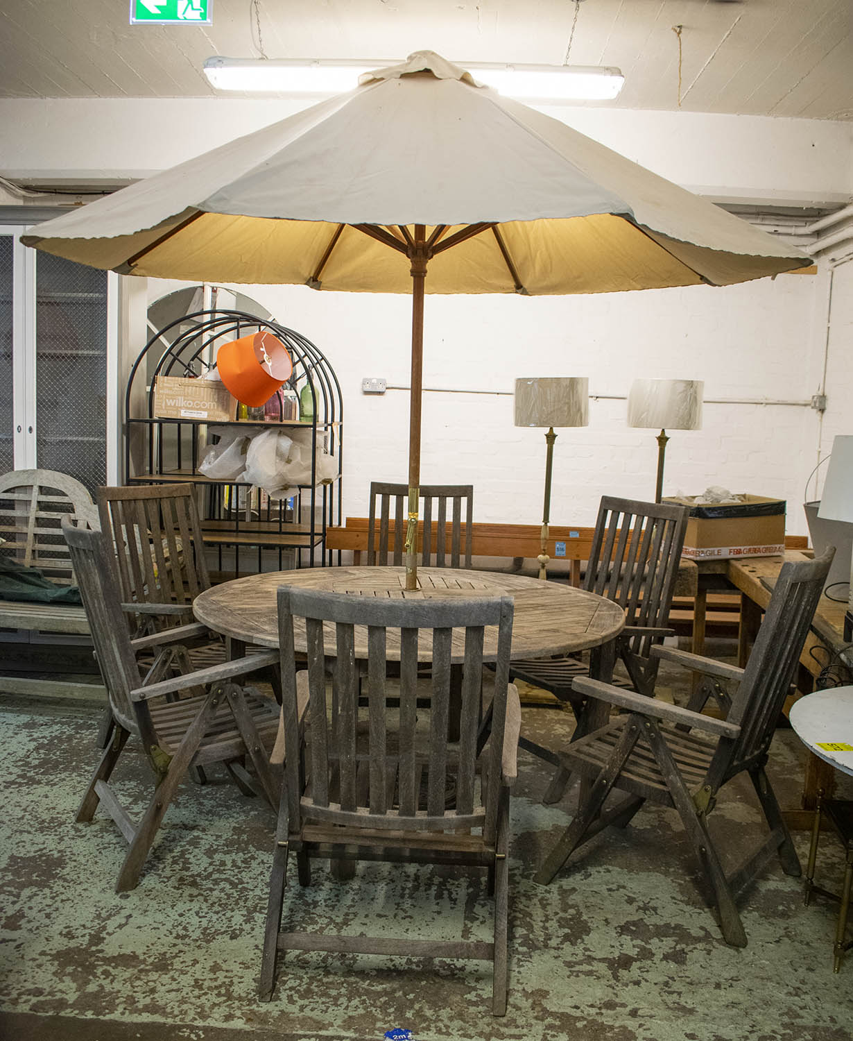 GARDEN DINING SET, including a circular table with teak dumb waiter, 73cm H x 50cm, an Alexander