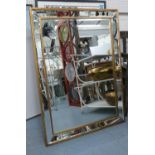 WALL MIRROR, 1970's Italian style, mirrored frame with gilt accents, 110cm xd 80cm.