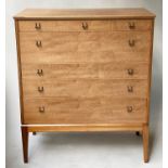 CHEST, 1960's, walnut, in the 'Heals' style, with five long drawers and tapering supports, 44cm D