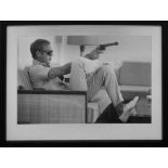 AFTER JOHN DOWNING, Steve McQueen with Gun, framed and glazed, 73.5cm x 53cm.
