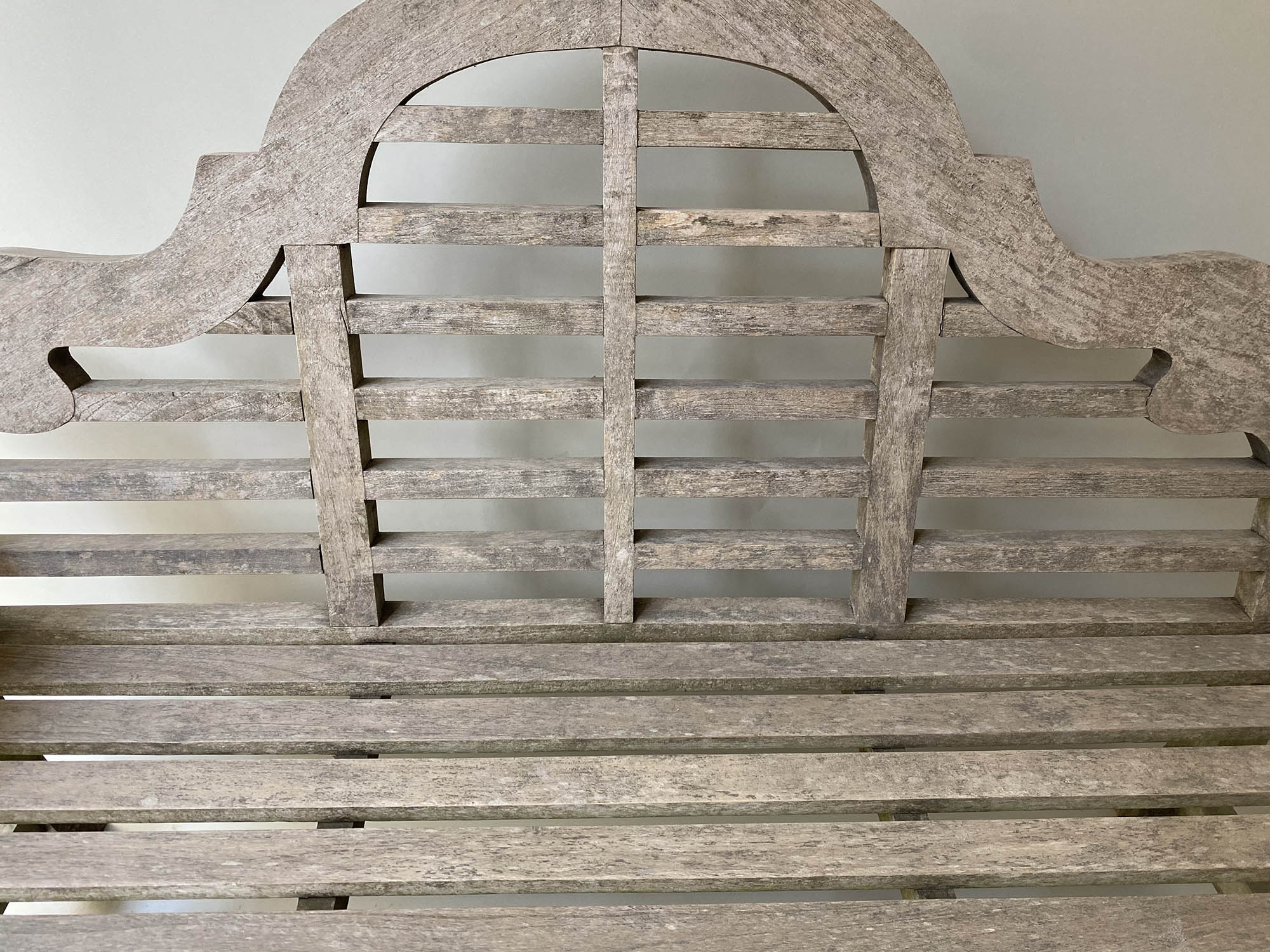 LUTYENS STYLE GARDEN BENCH, silvery weathered teak and of substantial slatted construction after a - Image 2 of 5