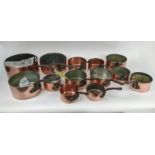BATTERY DE CUISINE, French copper pans, thirteen with iron handles, largest pan 27cm diam. (13)